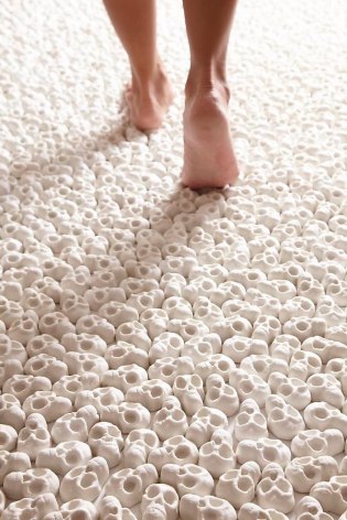 Nino Sarabutra, What Will You Leave Behind, 2012, unglazed porcelain skulls