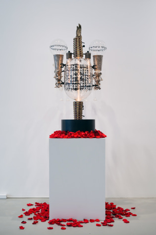 Ghiora Aharoni, What&#039;s in the Rose?, 2017, assemblage sculpture with antique silver icons and cuffs from India, antique Torah finials, fabric, vintage laboratory tubes, flasks and beakers etched with text from the Book of Genesis in Hebrew, tubular lights, steel base, 45 x 24 x 22 inches/114.3 x 61 x 55.9 cm