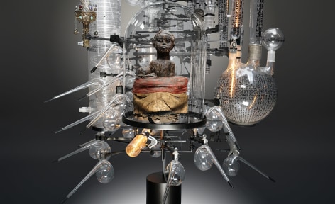 The Genesis Series - Day VI B, 2021, assemblage sculpture with glass beakers, tubes, flasks and domes with engraved, appliqué and printed text; laboratory clamps; icons and iconography, tubular lights and steel base, 72 x 42 x 42 inches / 182.9 x 106.7 x 106.7 cm