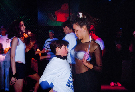 Adam, 13, and a go-go dancer hired to entertain at a bar mitzvah party at the Whisky a Go Go nightclub in West Hollywood, 1992, Archival Pigment Print