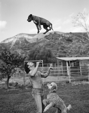 Patrick Swayze with his dogs, Hollywood, California, 1985, Silver Gelatin Photograph, Ed. of 10