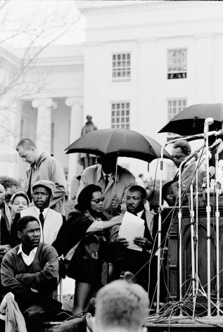 Coretta Scott King and Martin Luther King Jr. with John Lewis on the steps of the Montgomery Capitol at the conclusion of the Selma March, 1965