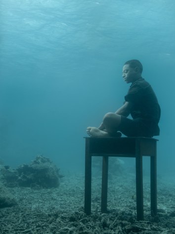 Keanan on School Desk, Fiji, 2023, Archival Pigment Print