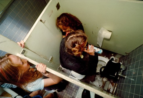 A freshman watches a sophomore inhale air freshener in the high school bathroom during nutrition break, Hollywood, Archival Pigment Print