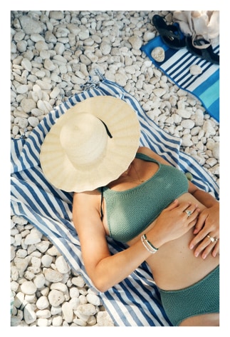 Maximilla on a stone beach in Kefalonia, 2021, Archival Pigment Print