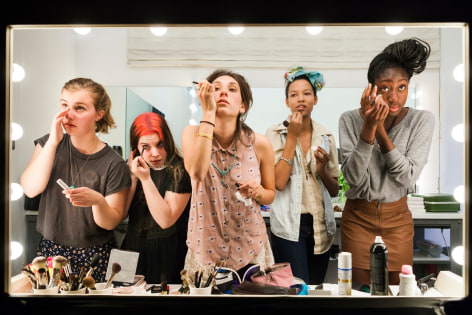 High school seniors (from left) Lili, 17, Nicole, 18, Lauren, 18, Luna, 18, and Sam, 17, put on their makeup in front of a two-way mirror for &quot;Beauty CULTure,&quot;Los Angeles, CA, 2011, 26 3/4 x 40 Inches,&nbsp;Archival Pigment Print, Combined Edition of 25