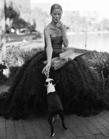 Carolyn Murphy sharing a pizza snack with her dog, Orlando, Florida, 1998, Silver Gelatin Photograph, Ed. of 10