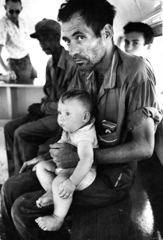 Man with Baby on Crew Bus, Migrant Workers, Arkansas,&nbsp;1961, Silver Gelatin Photograph