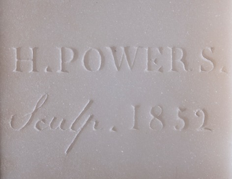 HIRAM POWERS (1805&ndash;1873), Greek Slave, 1852. Marble, 15 in. high. Detail of signature, date, and inscription on the back of truncation.