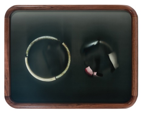 a photo showing broken ceramics which have been repaired by Maria Elena Gonzalez