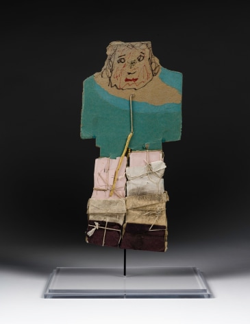 a paper construction/sculpture of a man wearing a blue coat by self-taught artist James Castle