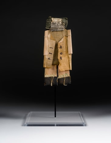 a paper construction/sculpture of a man wearing a coat by self-taught artist James Castle
