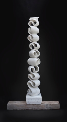 a hand-carved, abstract marble sculpture by Elizabeth Turk