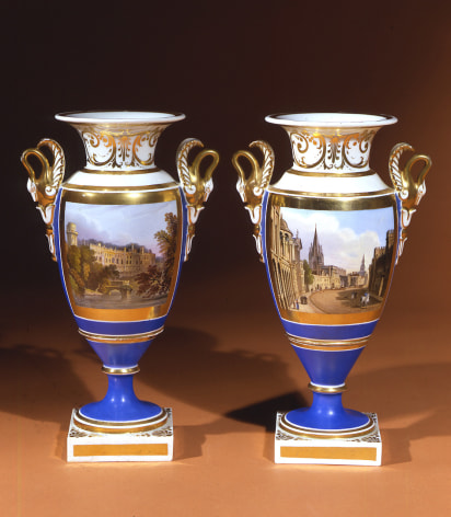 "Pair Blue Ground Vases with Swan Handles and with views of High Street," about 1820. Chamberlain’s, Worcester, England Porcelain, painted and gilded, 9 5/16 in. high