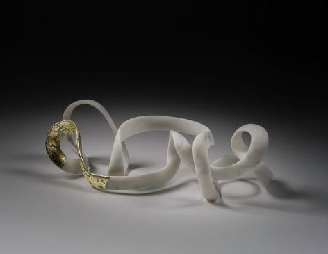 a sculpture by Elizabeth Turk of a thin looping bands of marble, a corner of which is covered in gold leaf