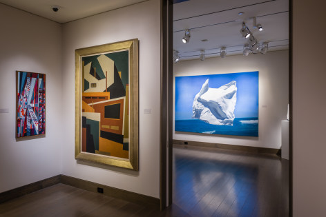&quot;Summer Selections 2023.&quot; Gallery 1 view with works by Edmund Lewandowski and Niles Spencer. A large work by David Ligare appears through the doorway to Gallery 3.