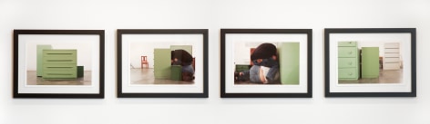 4 photographs of 4 sides of a green chest of drawers (cameras the same distance from each side) with Mike, and another green chest, 2011, Digital pigment prints