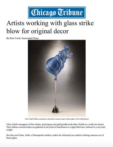 Artists working with glass strike blow for original decor