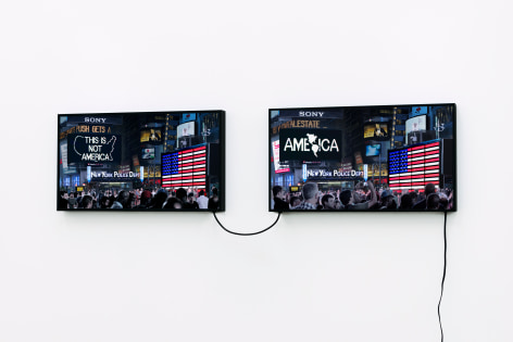 Alfredo Jaar A Logo for America (1987-2014), 2016 Two lightboxes with color transparencies Each: 20.5 x 36.5 x 4 inches (52.1 x 92.7 x 10.2 cm) Edition 2 of 3 with 2 APs (#2/3) (GP2092)  Alfredo Jaar A Logo for America (1987-2014), 2016 Two lightboxes with color transparencies Each: 20.5 x 36.5 x 4 inches (52.1 x 92.7 x 10.2 cm) Edition of 3 with 2 AP