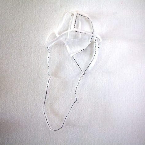Kathryn Clark  Wunderkammer 12, 2019  Machine and hand stitched cotton organdy  12h x 4w x 3d in -white cotton wall sculpture stitched by hand and machine