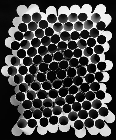 Black and white photograph of circular patterned imagery, by Gesche Wurfel