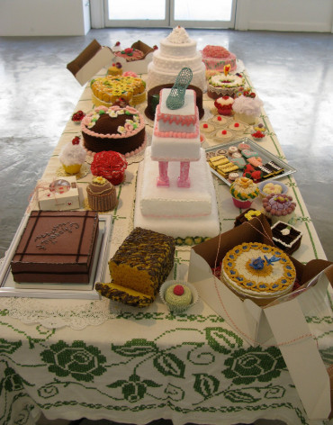 Fiber based replications of a table of baked sweets
