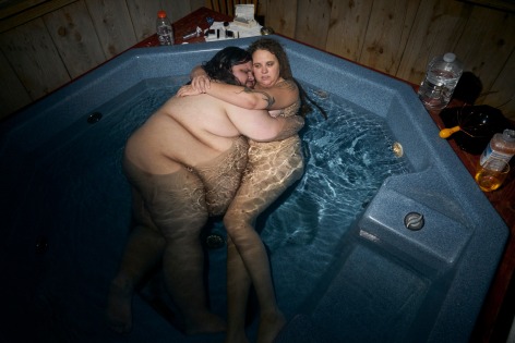 Stacy Kranitz  Hot Spring, North Carolina, 2019  Archival Pigment Print  Archival Pigment Print  16 x 24 inches, Edition of 7  27 x 40 inches, Edition of 3, nude couple embracing in a hot tub, North Carolina