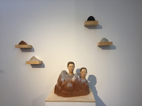 Sachiko Akiyama  Between Earth and Sky, 2012  wood, clay, paint,  17h x 17w x 17d in 43.18h x 43.18w x 43.18d cm  SA_002, three dimensional wall sculpture of mountains and female heads