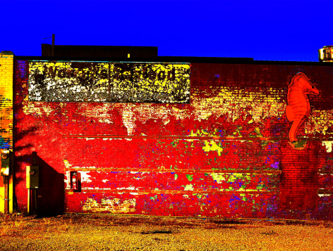 Brightly colored photograph of side of an old building