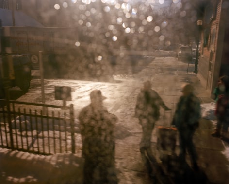 Hazy scene of people from train window, by McNair Evans