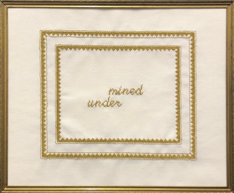 Kirsten Stolle  Inside Government Corruption, 2014  Embroidery floss on aida cloth in a vintage frame  9h x 12w in -The Word Mined is embroidered above the word under in the center of the aida cloth