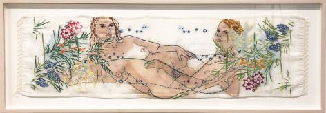 two nude women reclining in opposite directions with a embroidered flower border