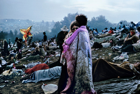 Cover of the Woodstock album. Couple embracing in early morning at the Woodstock festival.
