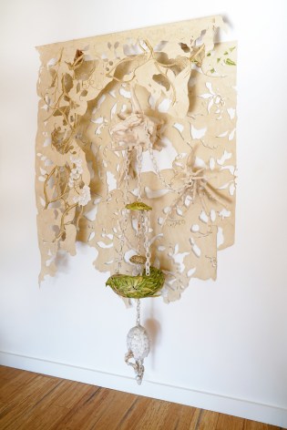 Hand cut floral wallpaper with cast paper, and canvas.