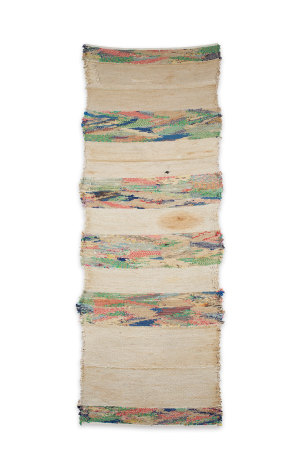 large fiberwork in muted cream and with bands of multiple primary colored lines.