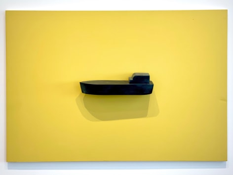 Wooden boat wall sculpture on yellow board