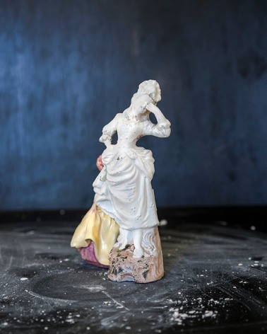James Henkel  Dramatic Figurine in Yellow Dress, 2018  Archival pigment print  20 x 16 inches  Edition of 5  30 x 24 inches  Edition of 3, contemporary art, photography, figurines
