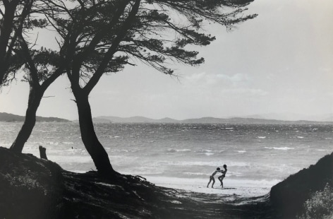 Bernard Plossu (1945-)  Untitled (Playing on beach, two trees), n.d.  Gelatin silver print  12 x 16 inches (paper) 8 x 11.5 inches (image), Black and White Photography