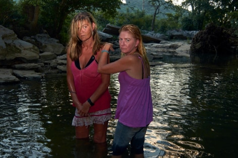 Stacy Kranitz  Dowelltown, Tennesee, 2011  Archival Pigment Print  16 x 24 inches, Edition of 7  27 x 40 inches, Edition of 3, Two women in a river, Tennessee