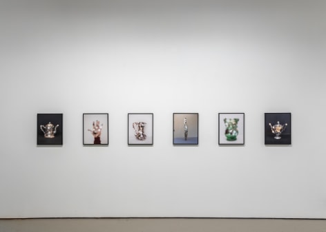Installation view of photographs of mirrored object