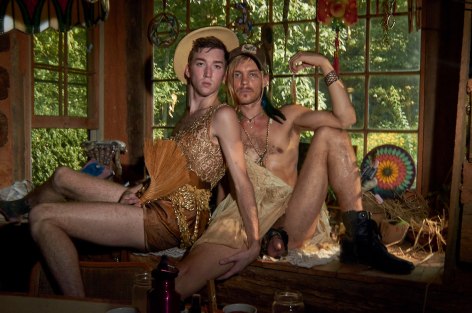 Stacy Kranitz  Short Mountain, Tennessee, 2012  Archival pigment print  16 x 24 inches, Edition of 7  27 x 40 inches, Edition of 3, Two men with fan and hats with genitals exposed, Tennessee