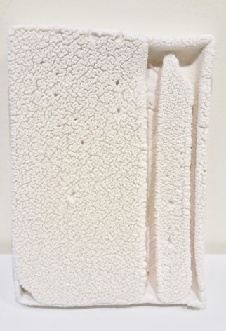 Cary Esser &quot;Parfleche&quot;, solid-cast earthenware with slip, 7.5&quot; x 5.37&quot; x 1.25&quot;, 2017 (sold), a rectangular ceramic &quot;parfleche&quot; , cracked warm white surface with two strong vertical elements on the right side