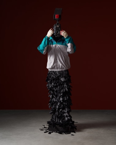 L&#039;homme &agrave; la cam&eacute;ra, 2015 FRP mannequin, windbreaker, gloves, feathers, broadcast camera 88.58 x 26.77 x 22.83 inches 225 x 68 x 58 cm, &nbsp;