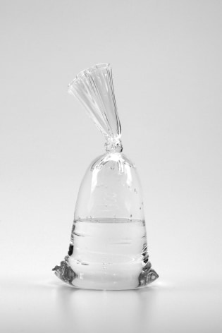 Glass sculpture by Dylan Martinez titled Glass Water Bag #B38, 2019, Hollow &amp; solid sculpted glass, 12 x 6 x 3.75 inches imagery plastic bag of water