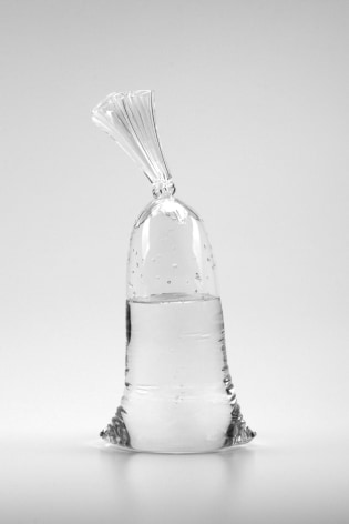 Glass sculpture by Dylan Martinez titled Water Bag #B34, 2021, Hollow &amp; solid sculpted glass, 15 x 6.75 x 4.5 inches imagery plastic bag of water