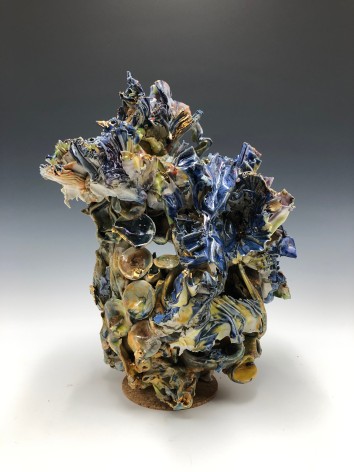 ceramic by Lauren Skelly Bailey titled Flow Through, 2022, Glazed stoneware, porcelain, multiple firings and gilded gold 8 x 6 x 5.5 in