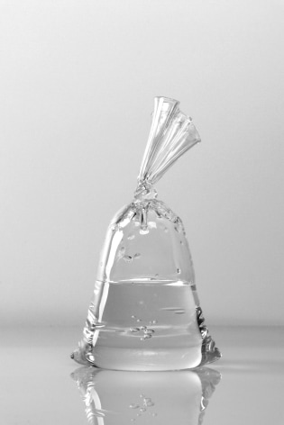 Glass sculpture by Dylan Martinez titled Water Bag #1931, 2019, Hollow &amp; solid sculpted glass, 11.5 x 6.5 x 3.75 inches imagery plastic bag of water