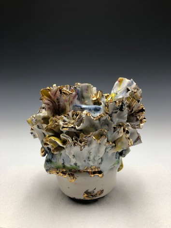 ceramic by Lauren Skelly Bailey titled Reef Ware V,  2022, Glaze stoneware with gold 4 x 3.5 x 3.5