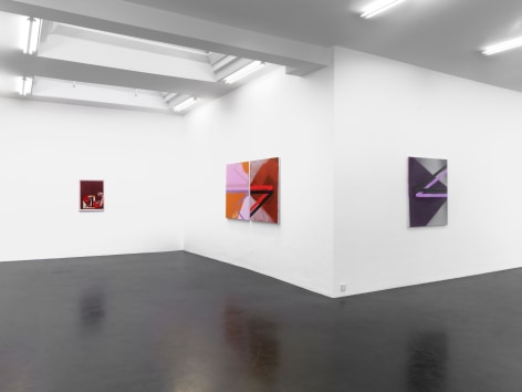 installation image of three paintings hanging on a wall. one is small and red, the middle is larger and made of pink, orange and red lines and color blocking, the third is purple and gray. all three hang on white walls.