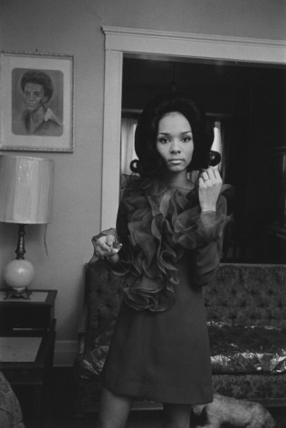 Young woman dressed for an evening out, 1968